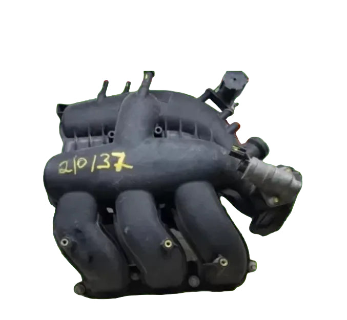 Car engine intake manifold with '21037' marking on a white background