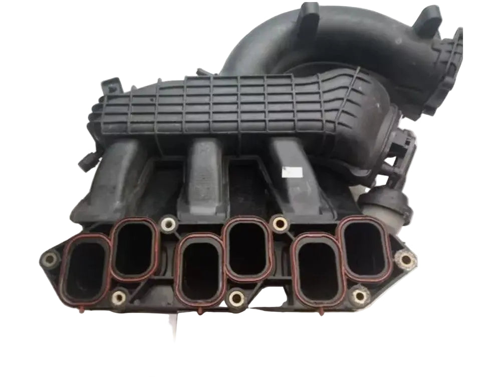 Car engine manifold on a white background